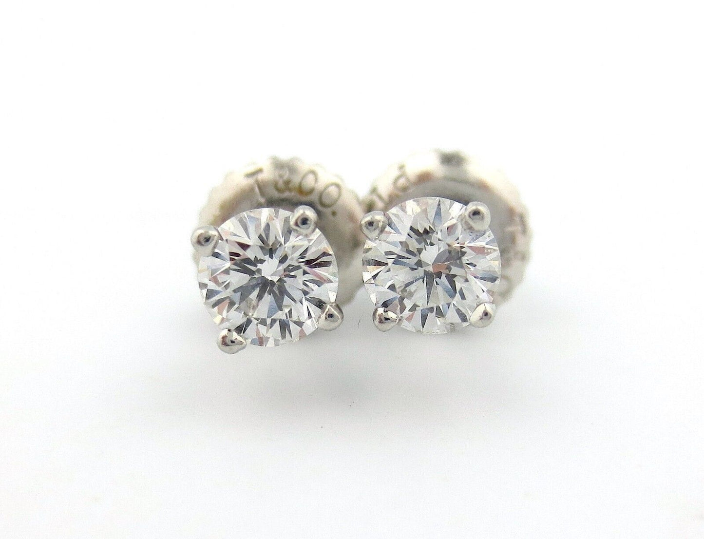 Tiffany & Co. Platinum 0.38ct H VS1 Round Diamond Stud Solitaire Earrings