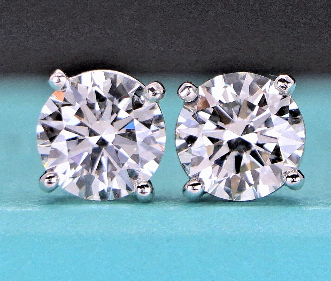 Tiffany & Co. Platinum 0.60ct I VS1 Diamond Stud Squeeze Back Earrings